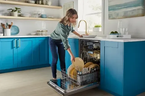 woman-loading-maytag-dishwasher